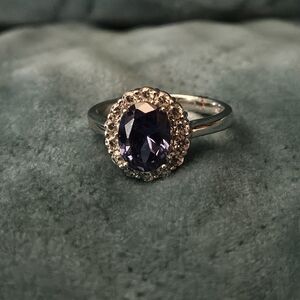 Elegant Silver and Purple Gemstone Ring